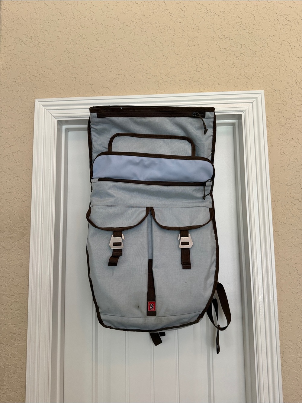 Light blue Roll-Top Men’s Backpack with Brown Trim